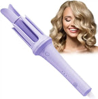 Purple hair curling iron with a woman with styled hair in the background